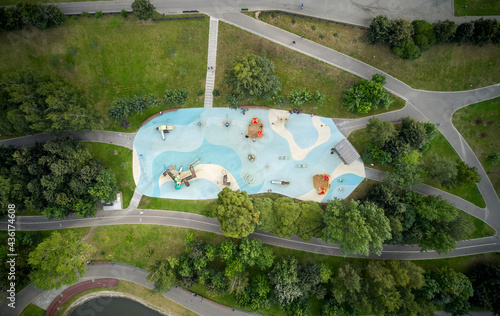 Top down aerial view of a playground for children in a public park