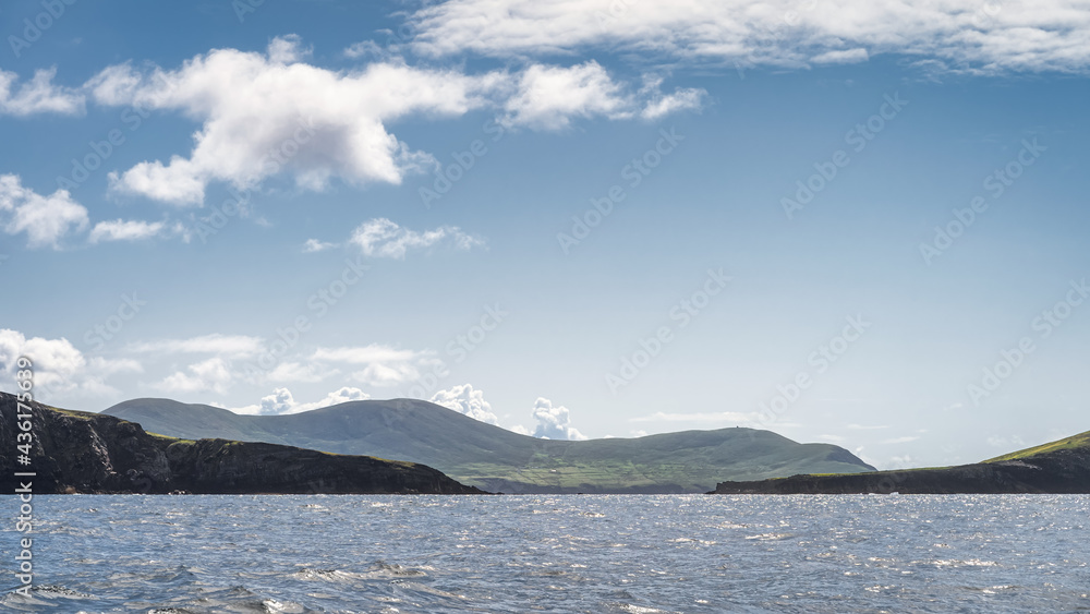 Natural gate to access Portmagee village between Bray Head and Kerry Cliffs seen from boat on Atlantic Ocean Iveragh Peninsula, Ring of Kerry, Ireland