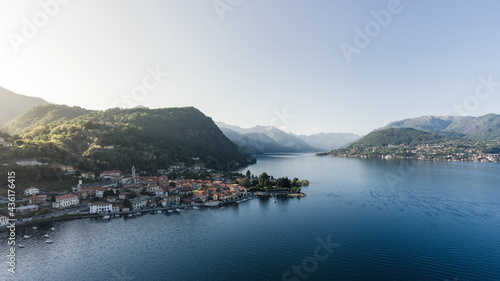 Pella village panoramic view on Lake Orta, Piedmont. Shot at sunset from a drone.