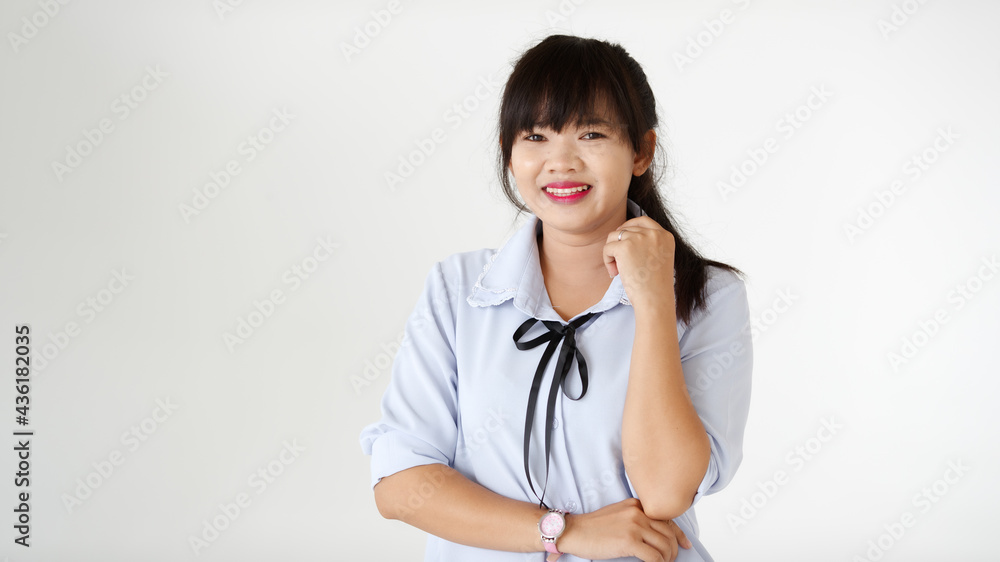 Portrait of a young teen Asian woman with smile face on white background Portrait of a young teen Asian woman with smile face on white background
