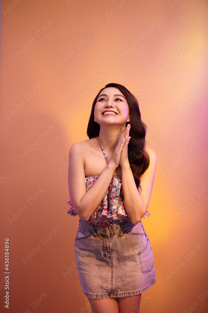 fashionable woman in a autumn color in light background fashionable woman in a autumn color in light background