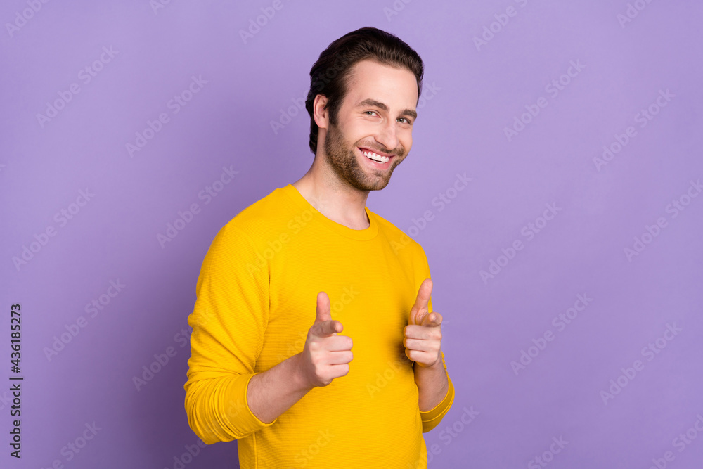 Portrait of attractive cheerful man pointing forefingers at you isolated over pastel violet purple color background Portrait of attractive cheerful man pointing forefingers at you isolated over pastel violet purple color background