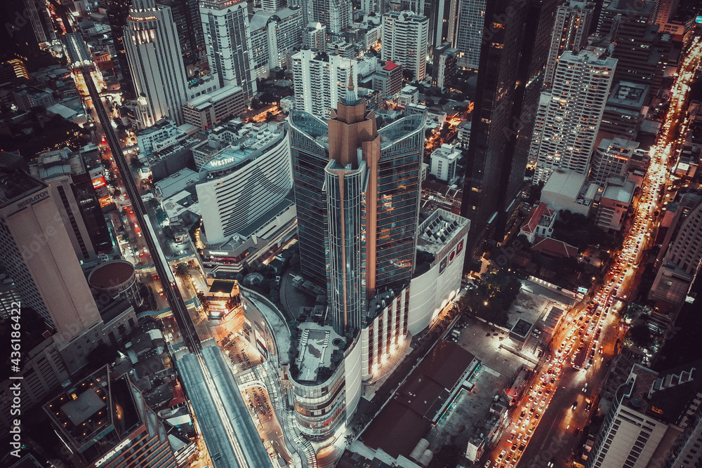 Fototapeta premium Aerial view of Asoke intersection and sky train station in Bangkok Thailand