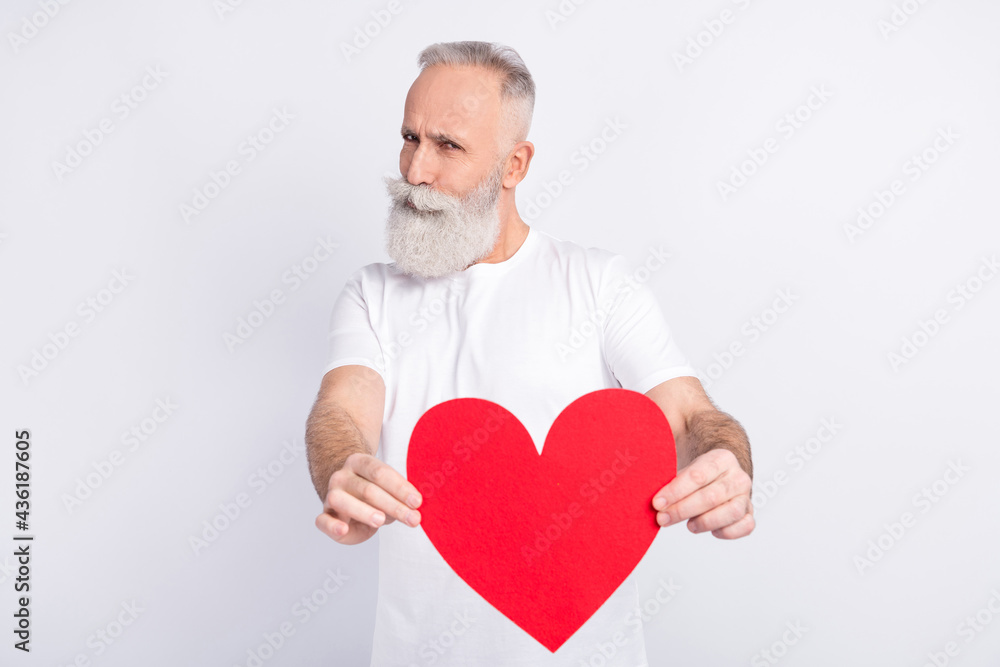 Portrait of attractive confident virile man guy giving you my heart isolated over white pastel color background Portrait of attractive confident virile man guy giving you my heart isolated over white pastel color background