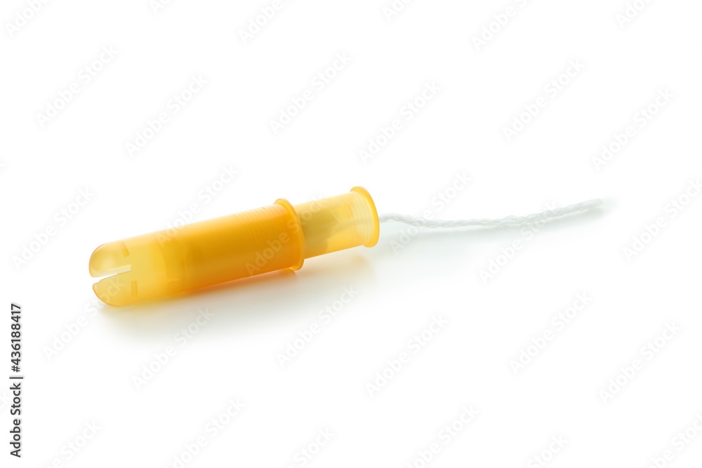 One unused tampon isolated on white background One unused tampon isolated on white background