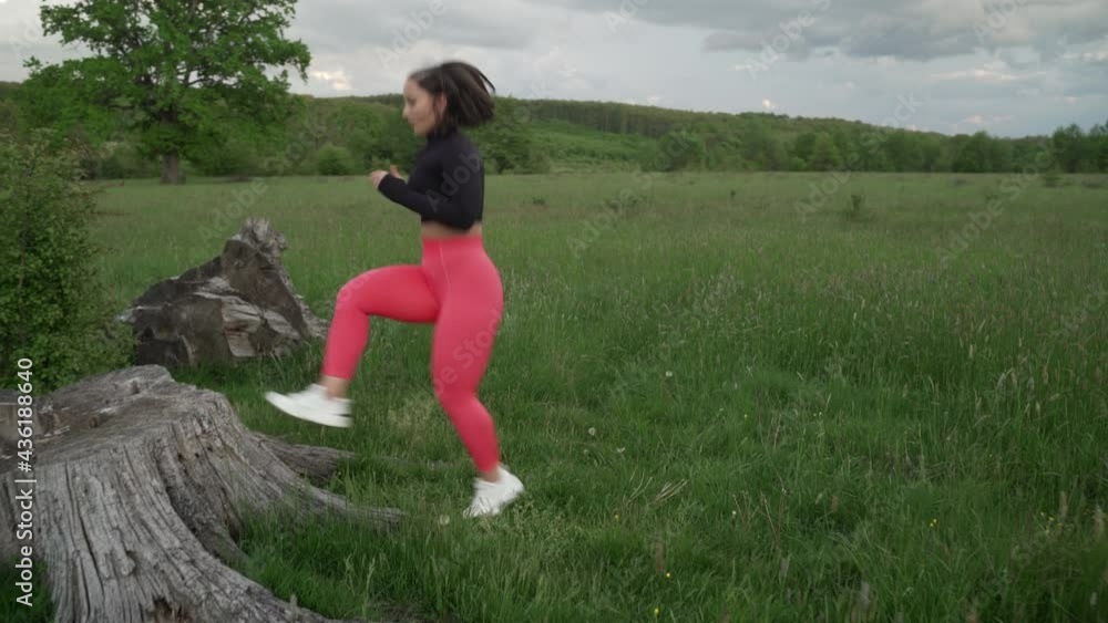 Size plus woman doing legs workout outdoor Size plus woman doing legs workout outdoor