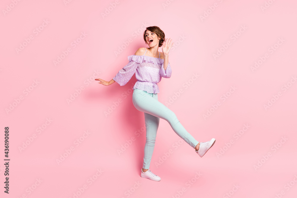 Full size photo of young lovely pretty cute excited cheerful girl dancing look copyspace isolated on pink color background