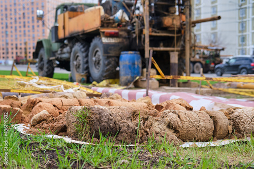 Drilling rig and soil samples for analysis for geological surveys for construction