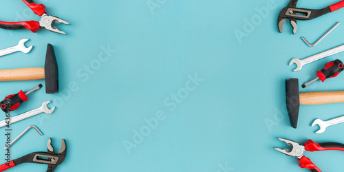 Working tools on a blue background. Father's day celebration concept. Copy plasticity for text.