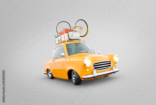 Funny retro car with laggage, suitcases and bicycle on the top
