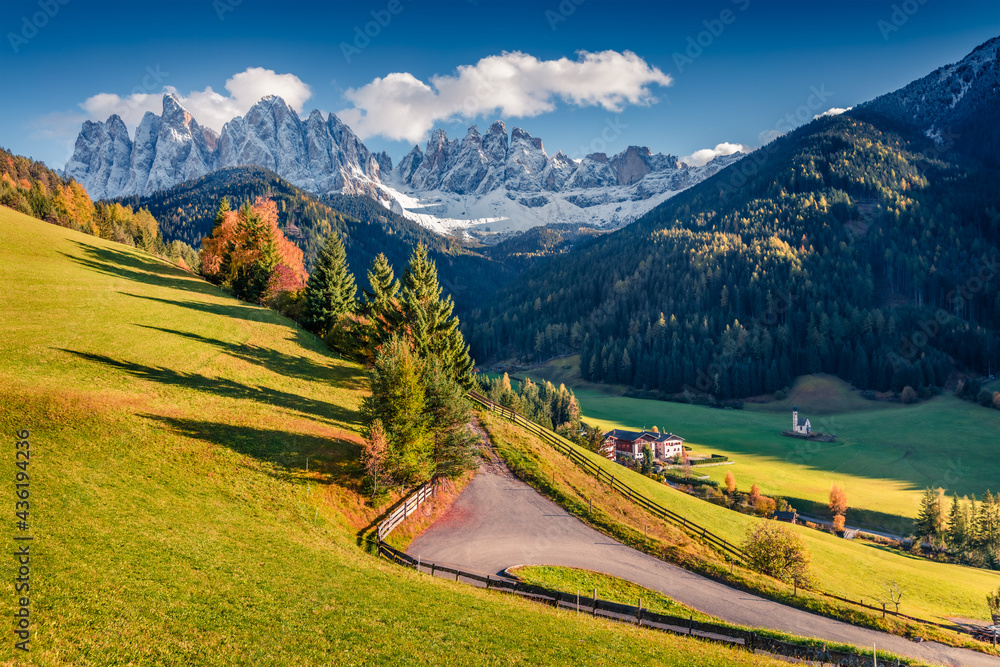 Astonishing autumn view of Santa Maddalena village in front of the Geisler or Odle Dolomites Group. Colorful morning scene of Dolomite Alps, Italy, Europe. Traveling concept background..