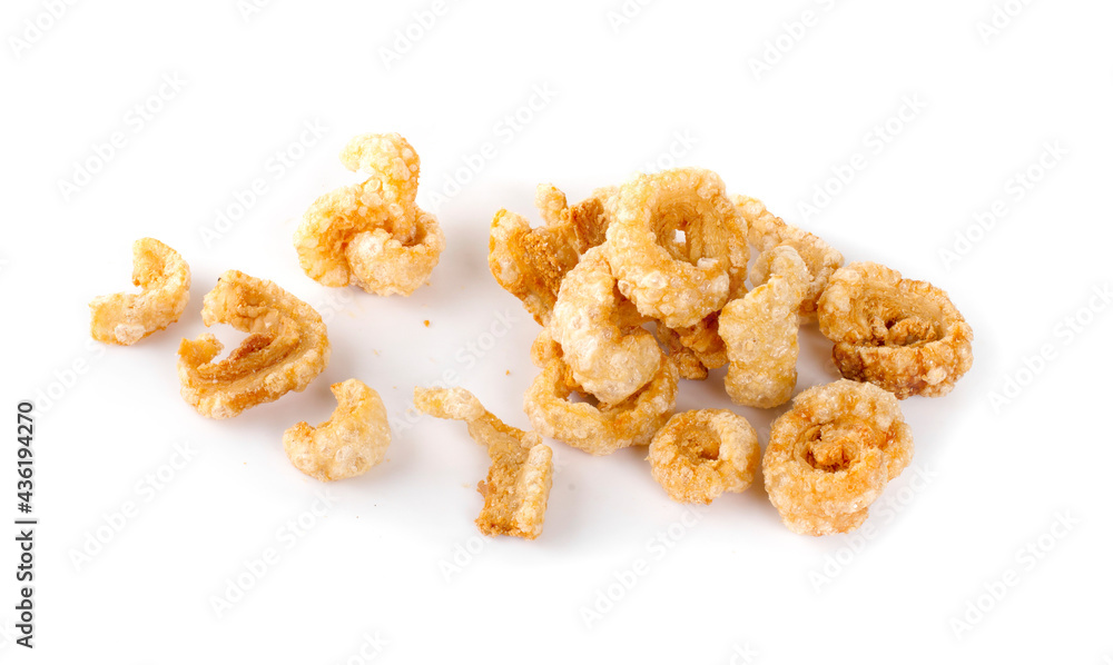 Pork snack or Pork scratching leather lean pork fried crispy and blistered isoloated on white background. Pork snack or Pork scratching leather lean pork fried crispy and blistered isoloated on white background.