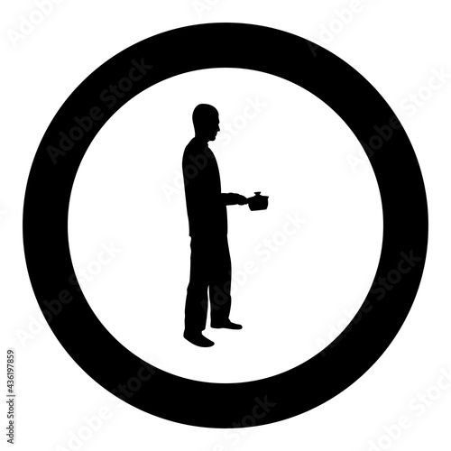 Man with saucepan in his hands preparing food Male cooking use sauciers silhouette in circle round black color vector illustration solid outline style image photo