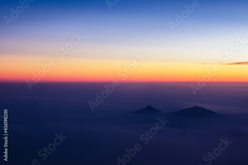 Beautiful aerial view on a mountains or volcano from the plane