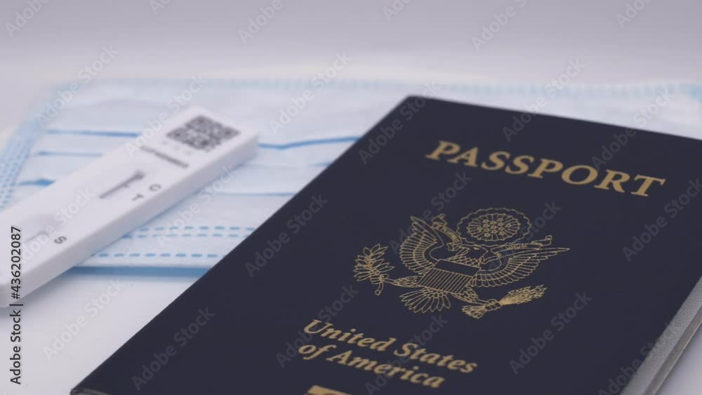 Coronavirus travel concept. Close up passport, face mask and negative COVID-19 test