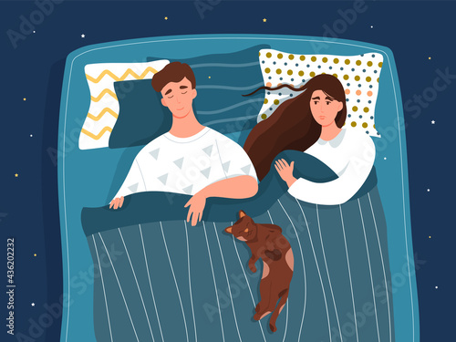 Cute couple is sleeping together with cat