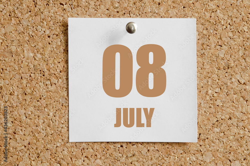 july 08. 08th day of the month, calendar date.White calendar sheet attached to brown cork board.Summer month, day of the year concept july 08. 08th day of the month, calendar date.White calendar sheet attached to brown cork board.Summer month, day of the year concept