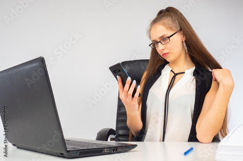 Girl office worker. The wom...