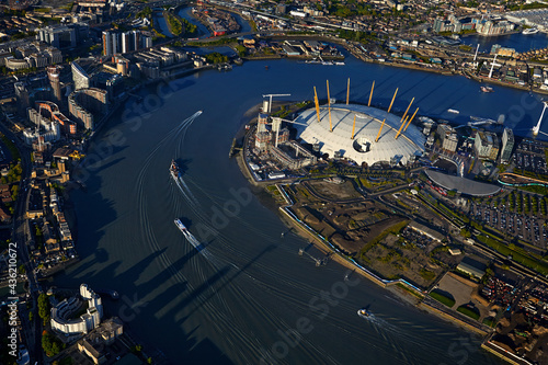 UK, London, Cityscape with O2 Millennium Dome and Thames river photo