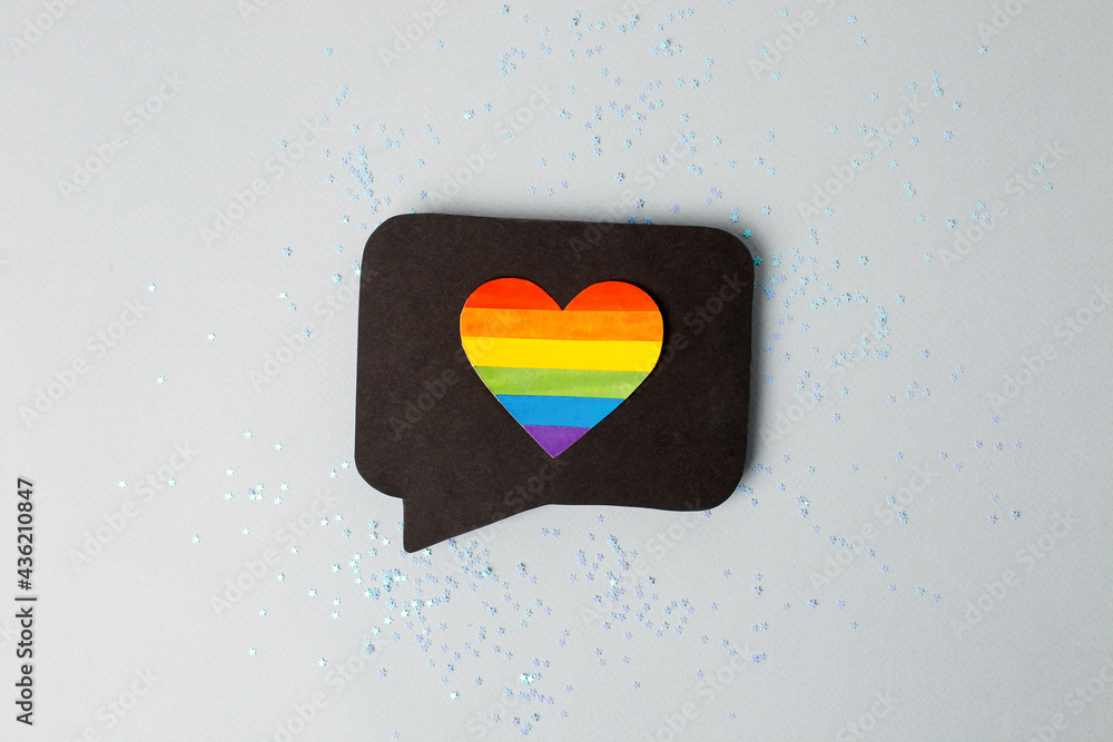 Happy Pride month banner for lgbt rights or social issues event. Colorful rainbow heart in black social media interaction cloud, symbol for homosexual love, marriage, partnership sex