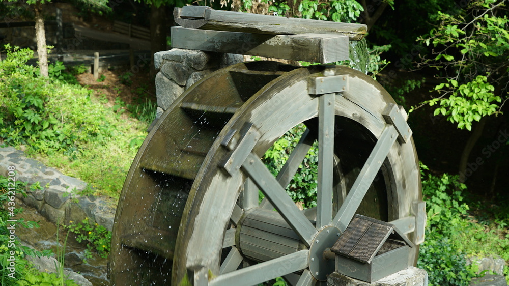 Water Wheel on the Park at Sunny Day Spring