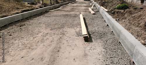 Bilde på lerret Road repairs. Laying of a curbstone. New curbs.
