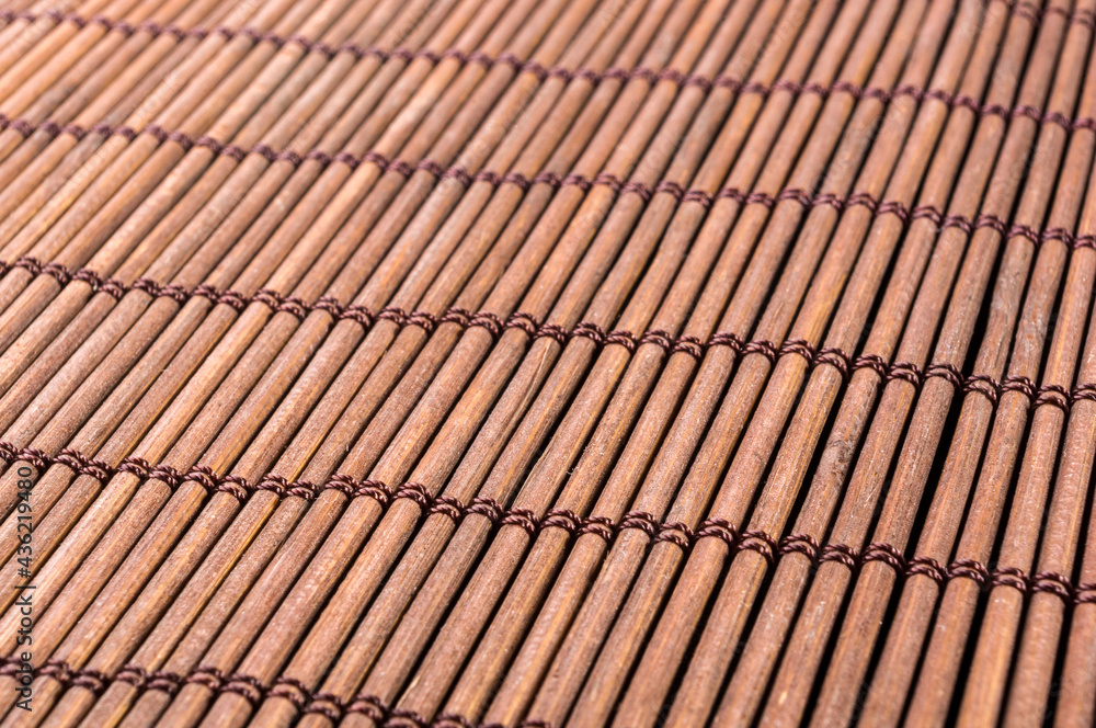 brown bamboo Mat - stand food, close-up, macro brown bamboo Mat - stand food, close-up, macro