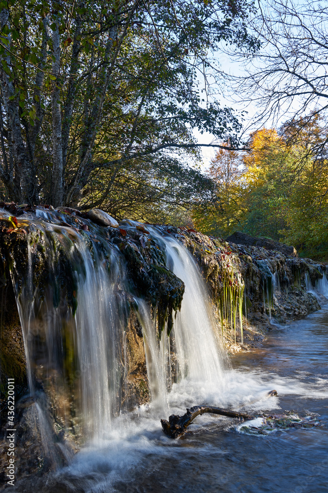 Image of an oil stain in a mountain stream. Image of an oil stain in a mountain stream.