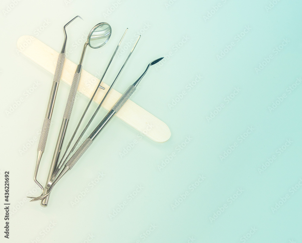 Dentist tools on the desk table. Concept of oral health care. Dentist tools on the desk table. Concept of oral health care.