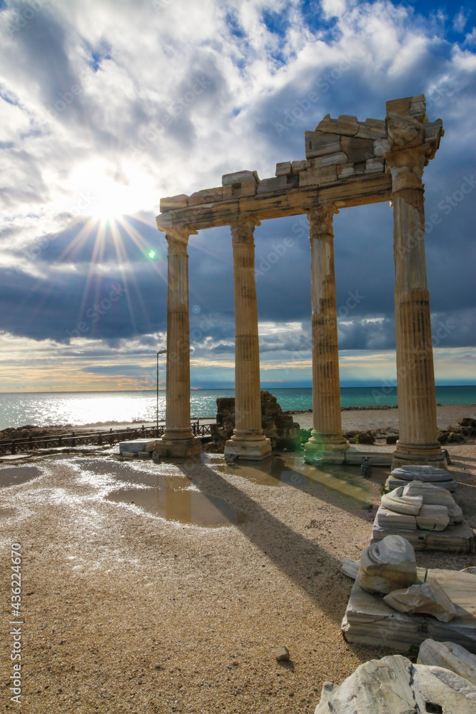Temple of Apollo rain after with cloudy sky, Greek ancient historical antique marble columns in Side Antalya Turkey