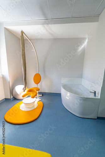 New modern maternity hospital ward. Health care baby ward interior. photo