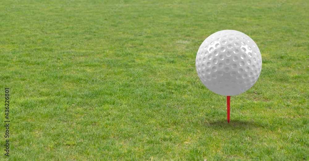 Composition of golf ball in grass on red tee and copy space Composition of golf ball in grass on red tee and copy space