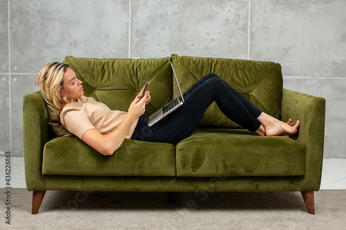 Young attractive blonde woman at home with laptop © Leyla Ramazanova