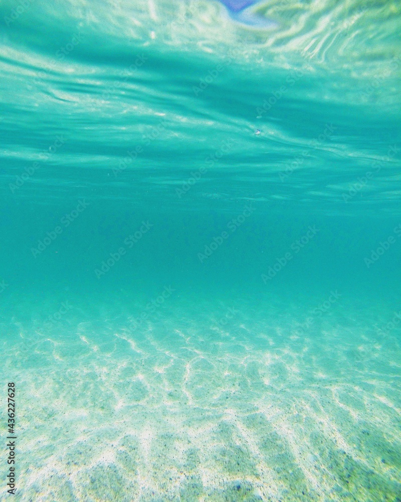 Turquoise blue water under neath the surface