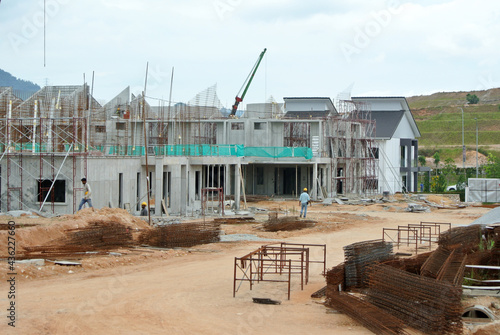 SEREMBAN, MALAYSIA -APRIL 16, 2020: New double story luxury terrace house under construction in Malaysia. Designed by an architect with a modern and contemporary style. 