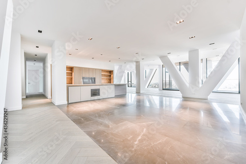 Tableau sur toile Interior of penthouse apartment with parquet and marble flooring and minimalist