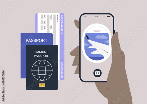 A tourist set, a travel document, an immunity passport, a boarding pass, a smartphone with an airplane wing image on it