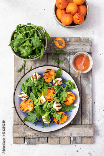 grilled apricot salad with halloumi cheese and arugula
