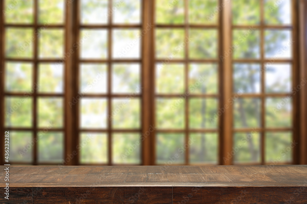Fototapeta premium Desk of free space and window background 
