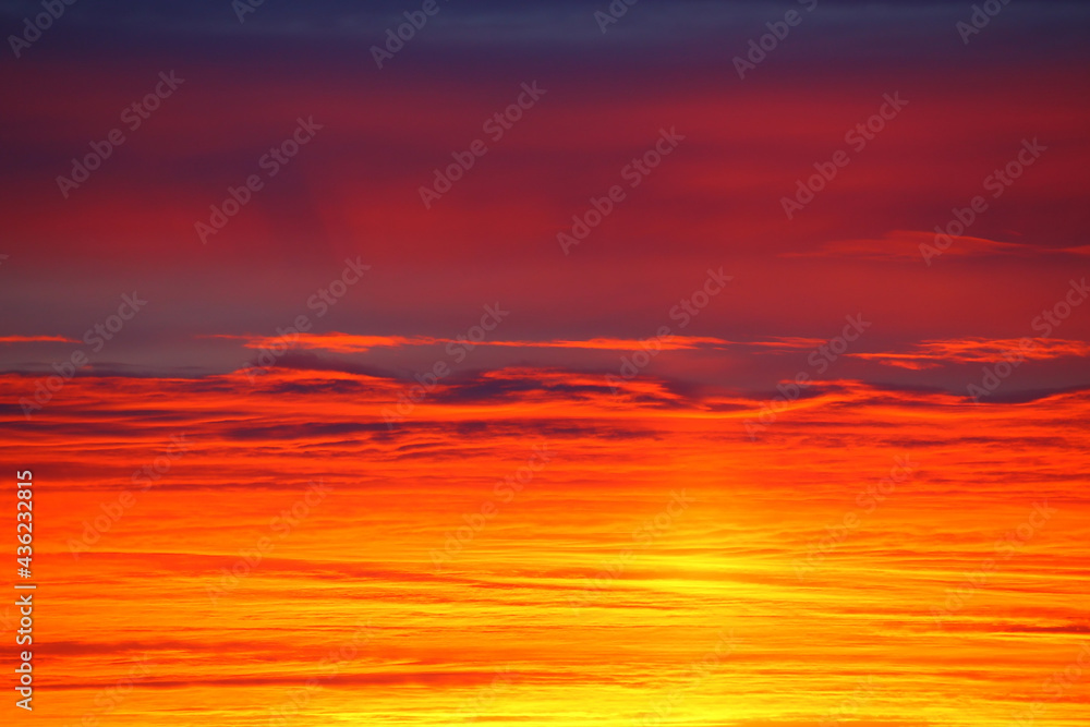 Layered cloudscape in orange and pink color