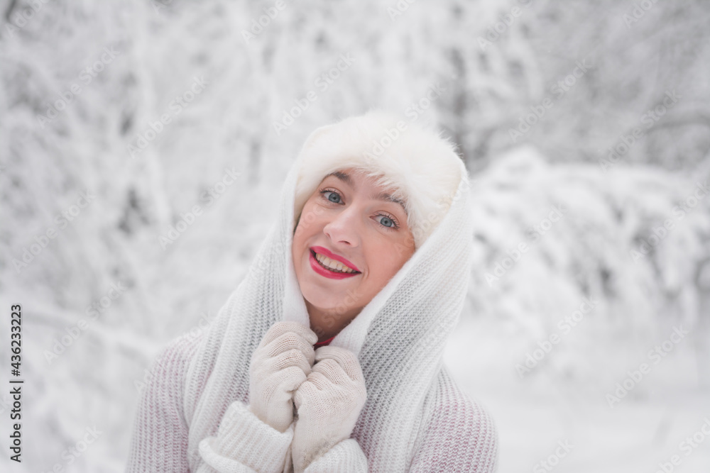 Beautiful girl in winter snowy forest in christmas clothes Beautiful girl in winter snowy forest in christmas clothes