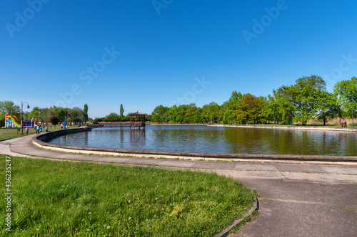 Kikinda, Serbia - May 04, 2021: The idylic rest zone - The Old lake (Staro Jezero: serbian) in the park of Kikinda town, Serbia