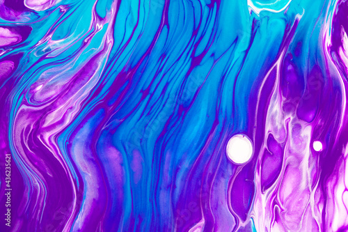 Fluid art texture. Backdrop with abstract mixing paint effect. Liquid acrylic artwork with chaotic mixed paints. Can be used for posters or wallpapers. Purple, blue and white overflowing colors.