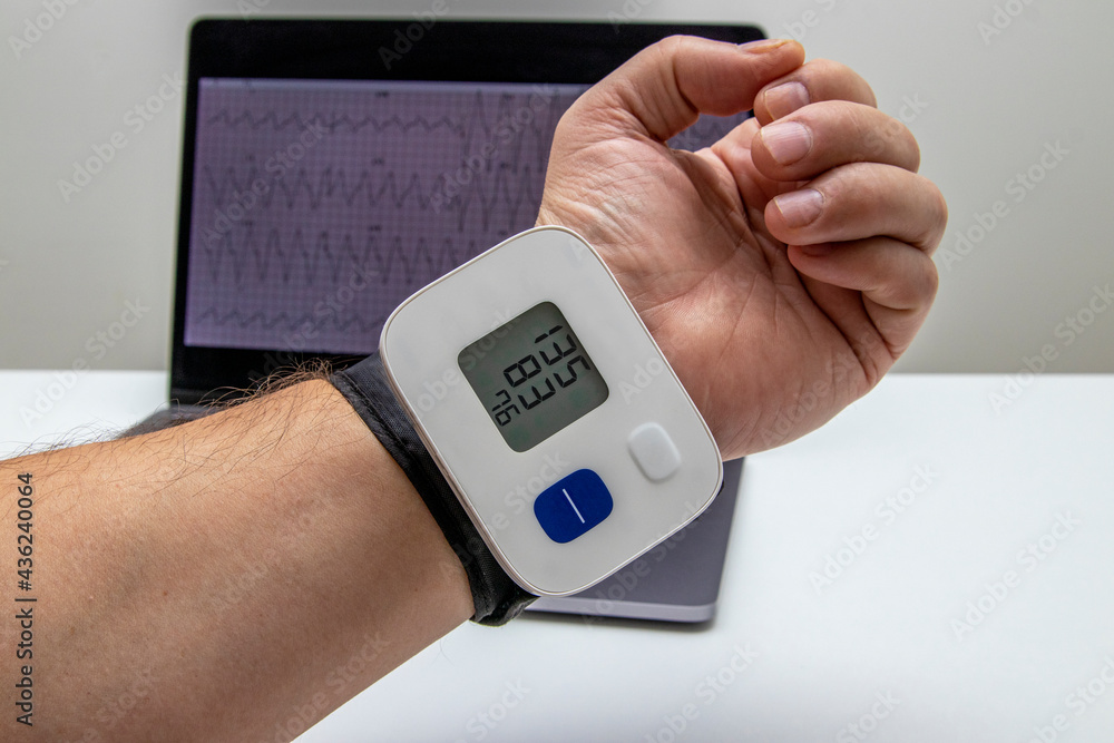 A device for measuring blood pressure and pulse rate. Fixed on the wrist. A device for measuring blood pressure and pulse rate. Fixed on the wrist.