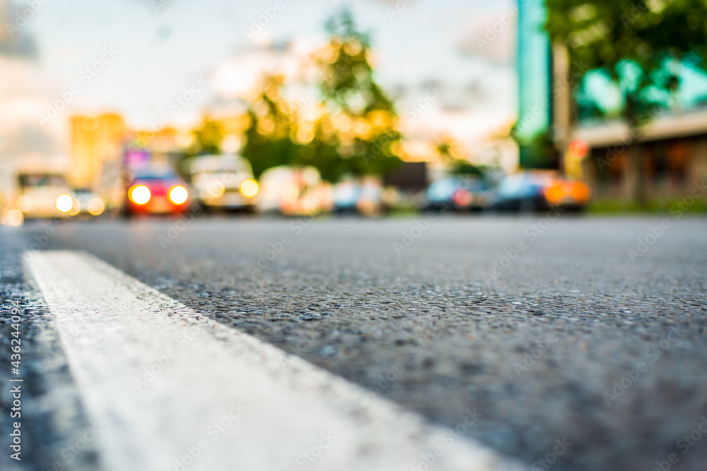 Sun after the rain in the city, view of the approaching cars with the level dividing line Sun after the rain in the city, view of the approaching cars with the level dividing line