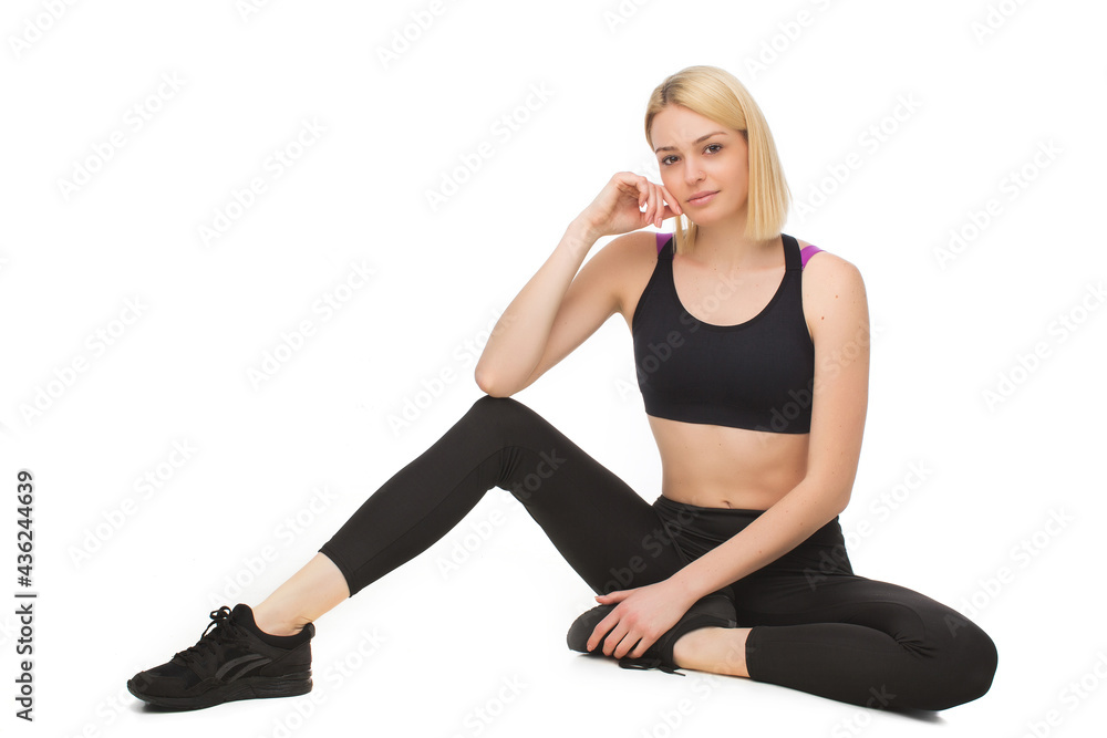 Fototapeta premium Young blonde woman in sportswear