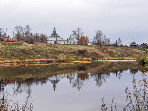 The Tura River and the Church of the Savior Image Not Made by Hands. The village of Krasnogorskoe. Verkhotursky district. Sverdlovsk region. Russia