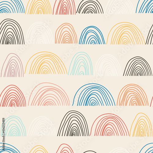 Cute geometric pattern. Hand drawn rainbow doodle vector seamless background in bright colors. Summer design.