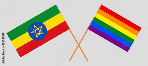 Crossed flags of Ethiopia and LGBTQ. Official colors. Correct proportion