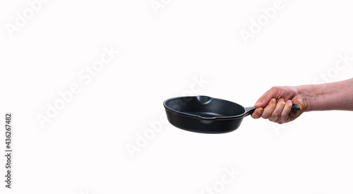 Photos Man holding teflon frying pan on white background